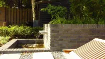 images/mes/6 strakke waterbak gecombineerd met split split in een moderne tuin hovenier -210x119-3f4
